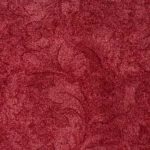 Close-up of red floral textured carpet
