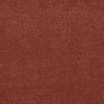 Close-up texture of a burnt red frieze carpet
