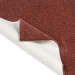 Red carpet sample showing white felt backing