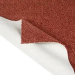 Red carpet swatch showing white felt backing