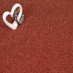 Red ribbed carpet with heart-shaped decor