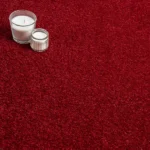 Red ribbed carpet with white decorative swans